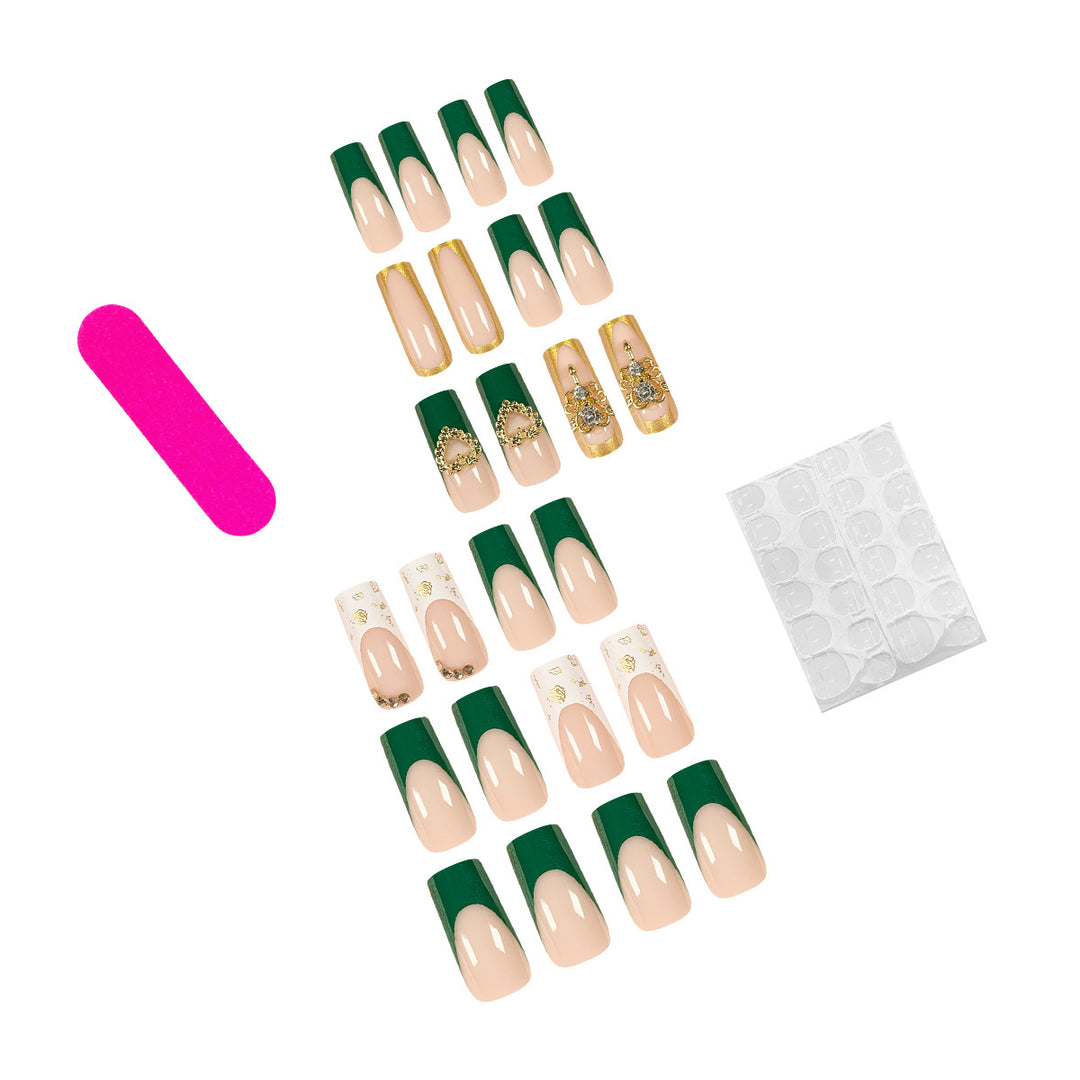 Exquisite artificial nails with gold embellishments and glitter accents Stornfield
