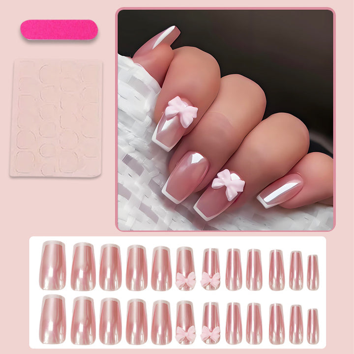 Artificial nail set with stylish bows and elegant French tips Stornfield