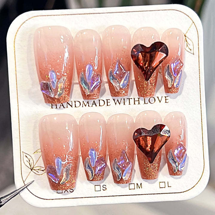 Artistic acrylic nails with heart design and sparkling accents Stornfield