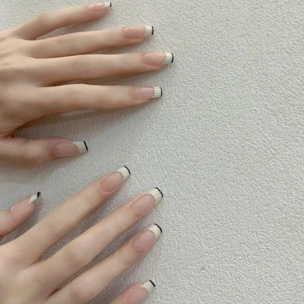 French Tip Press-On Nails with Elegant Black Detailing Stornfield