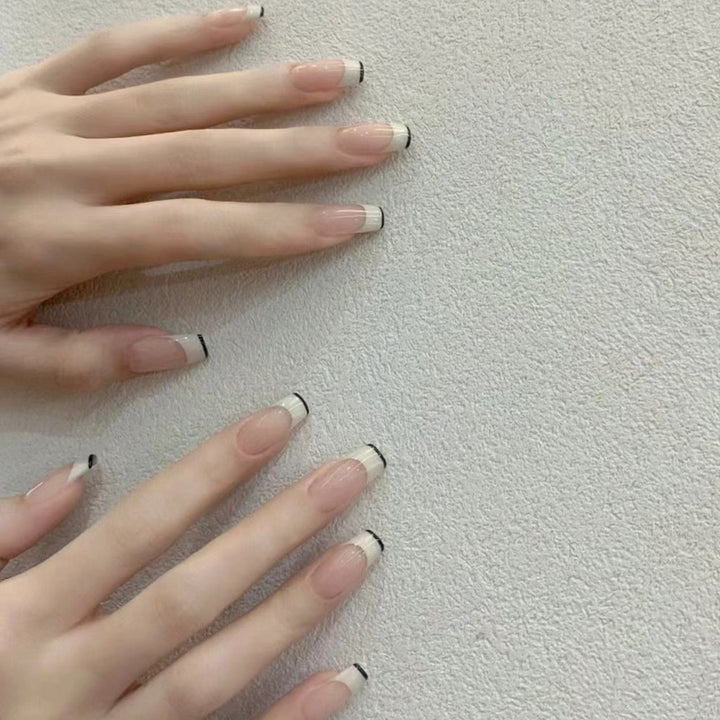 French Tip Press-On Nails with Elegant Black Detailing Stornfield