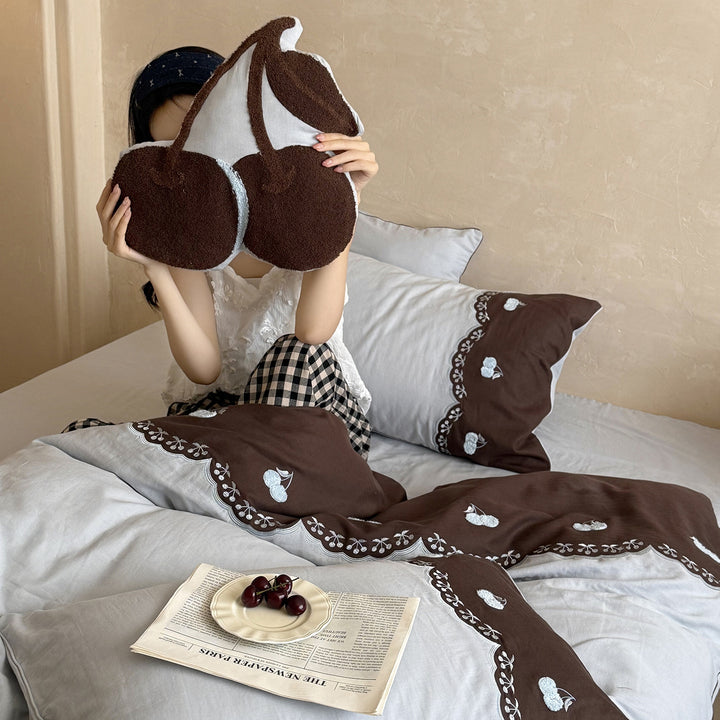 Bedding set made of cotton satin with embroidered cherry motif and decorative frill
