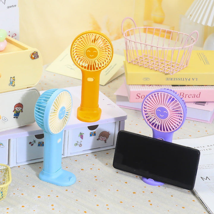 Ladies Portable Hand Fan with Smiling Face and USB Charging Function Stornfield