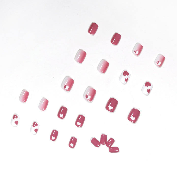 Creative nail art with heart motif and high-gloss finish Stornfield