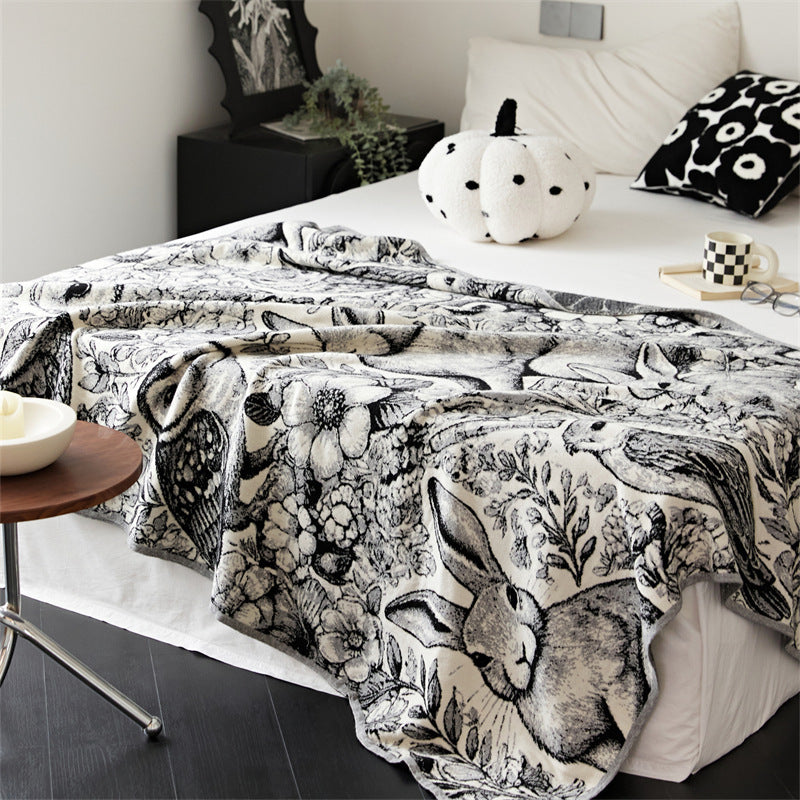 Cozy throw blanket with detailed jacquard animal motif
