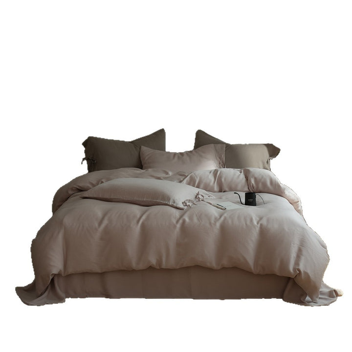 Bedding set made of finely woven cotton satin with ties, fitted sheet, and quilted blanket