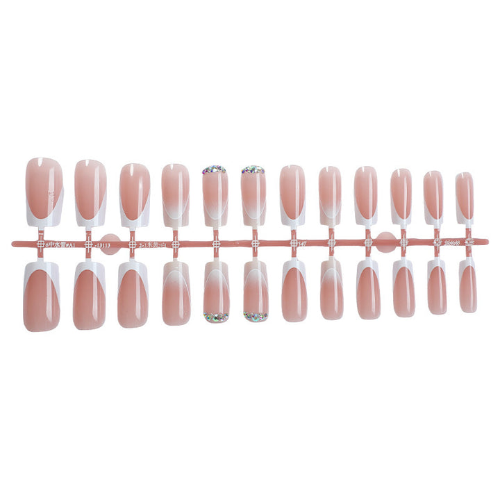 Artificial nail set with elegant ombre accents and seductive rhinestones Stornfield