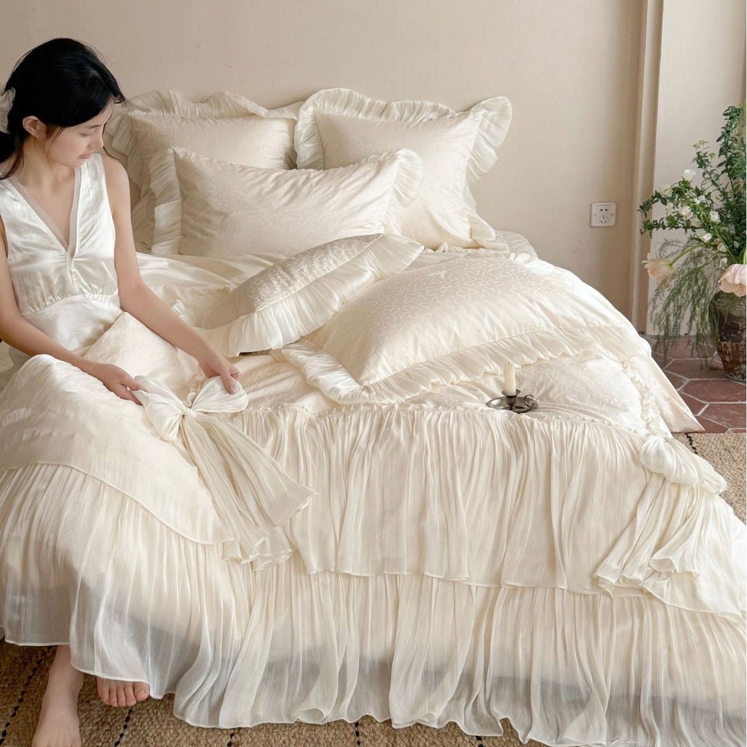 Elegant pleated bed set with gathered bed skirt and decorative pillows