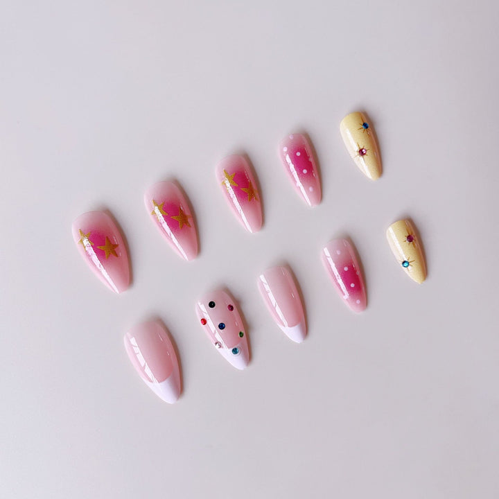 Artificial nail set with creative 3D designs and glitter accents Stornfield