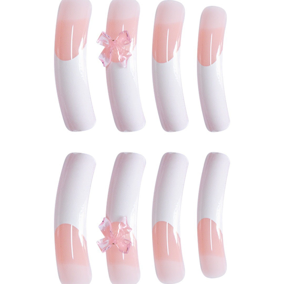 Elegant Nail Art Enhancements with Decorative Bow Accents Stornfield