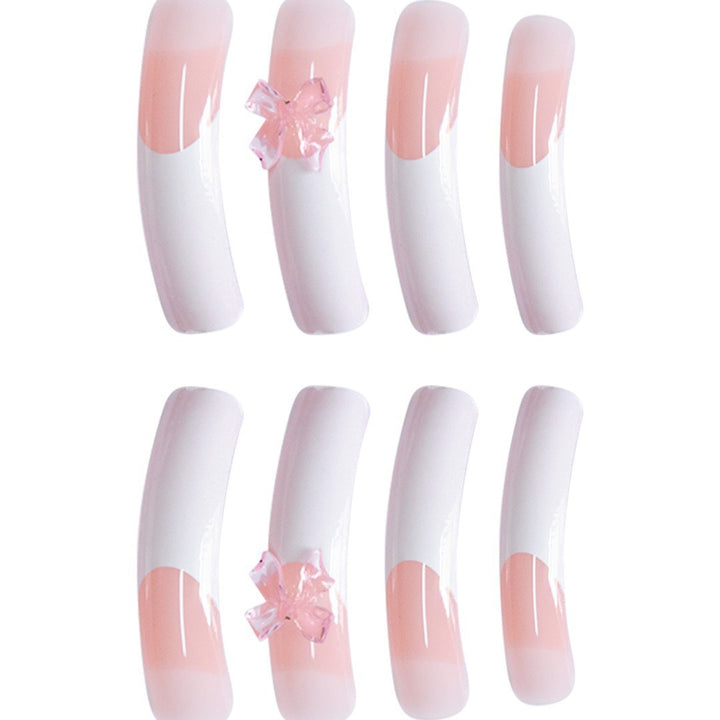 Elegant Nail Art Enhancements with Decorative Bow Accents Stornfield