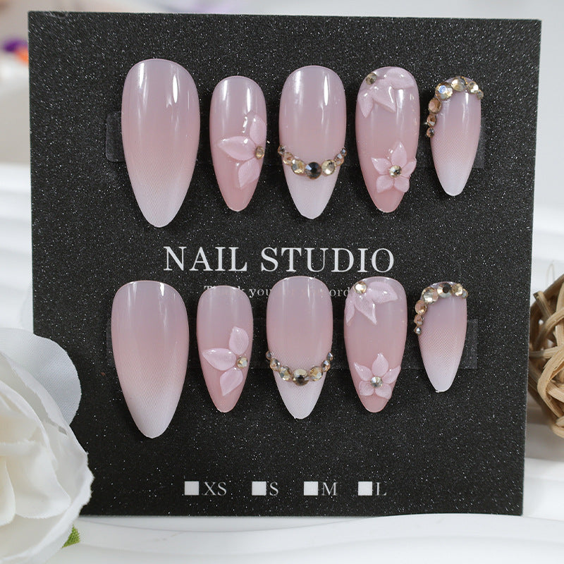 Artificial nail set with romantic flower and glitter accents Stornfield