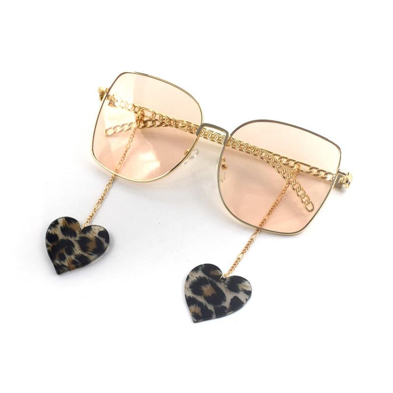 Heart-Shaped Dangle Earrings with Golden Chain Stornfield