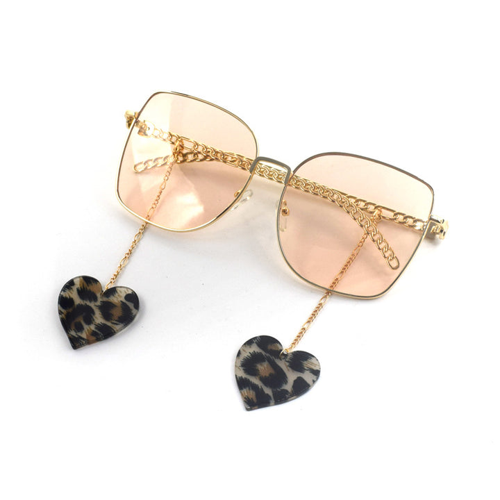 Heart-Shaped Dangle Earrings with Golden Chain Stornfield