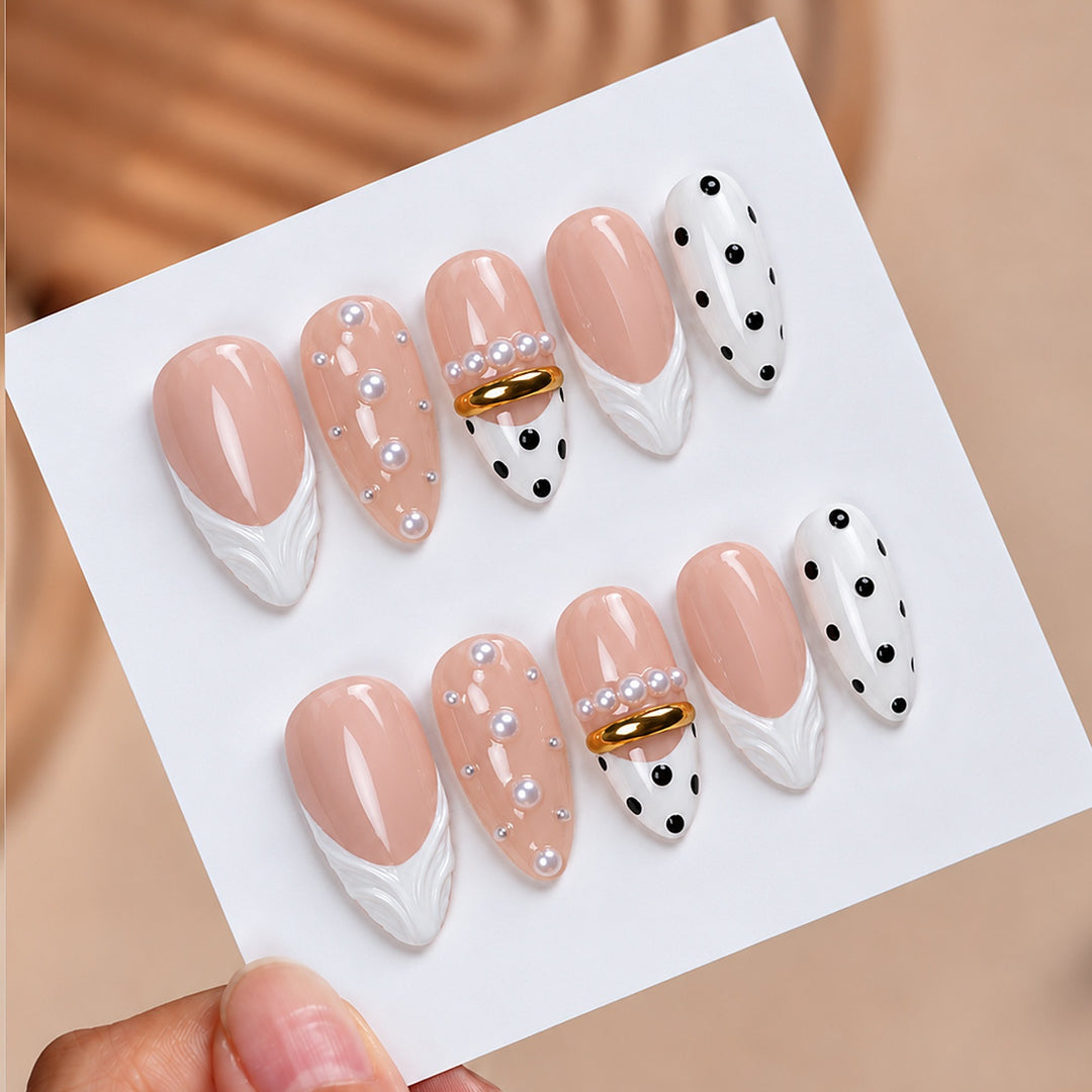 Artificial artificial nails with fashionable dots and embellishments Stornfield