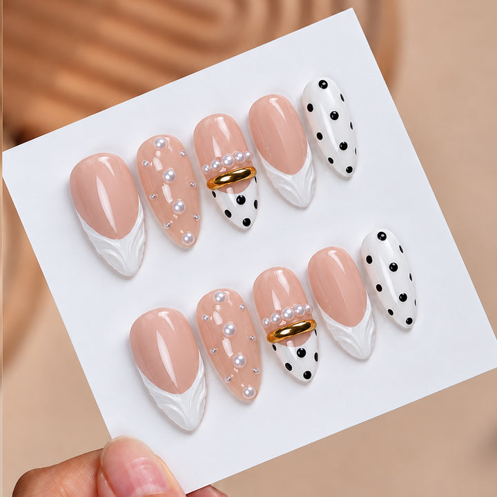 Artificial artificial nails with fashionable dots and embellishments Stornfield