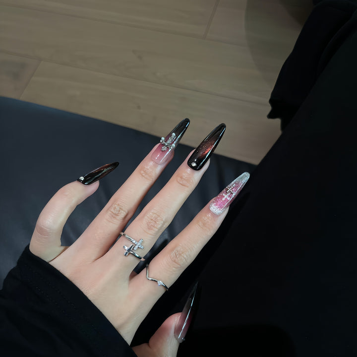 Glamorous artificial nails with shimmering color gradient and cross design Stornfield