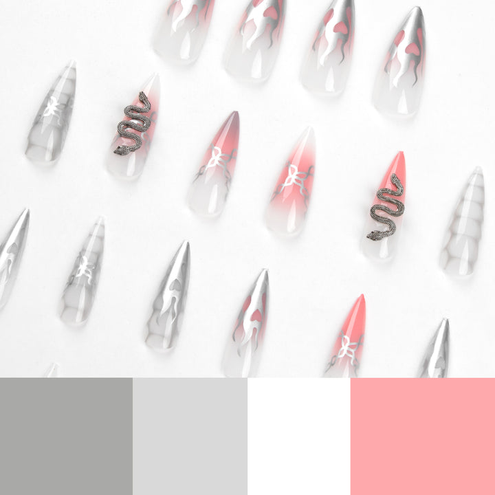 Artistic stiletto nails with snake motif Stornfield