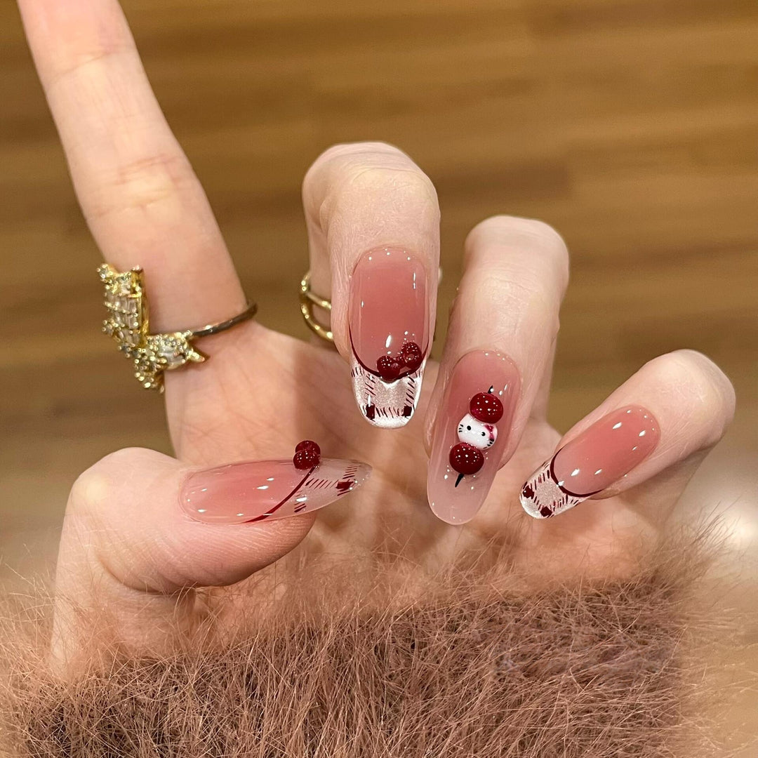 Artificial nails with playful Hello Kitty design Stornfield