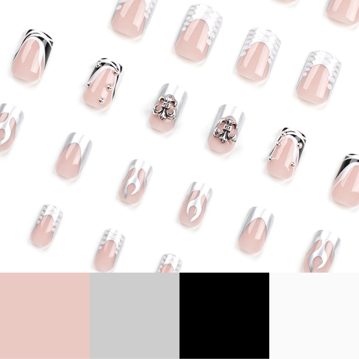Artistic nail extensions with metallic embellishments Stornfield