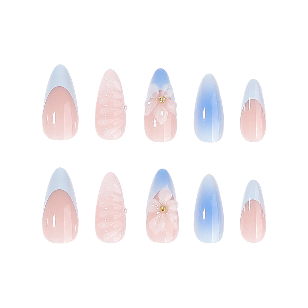 Stiletto nails with floral design and glitter accents Stornfield