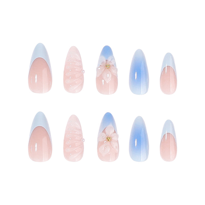 Stiletto nails with floral design and glitter accents Stornfield