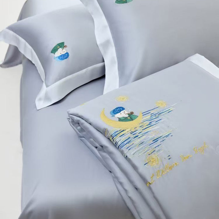 Satin bedding set with illustrative portrait embroidery and fine satin trim