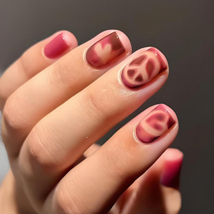 Acrylic nail set with elegant heart and pattern designs Stornfield