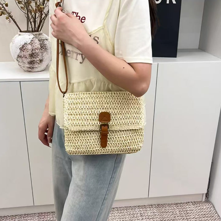 Handbag made of woven natural material with leather accents Stornfield