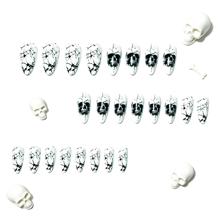Artificial nails with playful skull design and crackle effects Stornfield