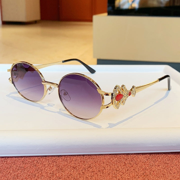Ladies elegant rectangular sunglasses with glamorous embellishments Stornfield