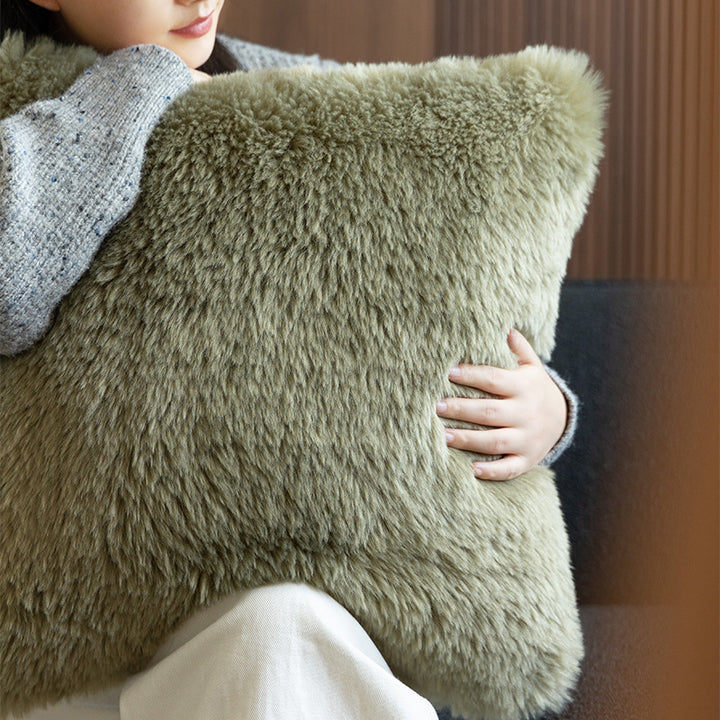 High pile rectangular cushion made of artificial fur with fine texture and zipper