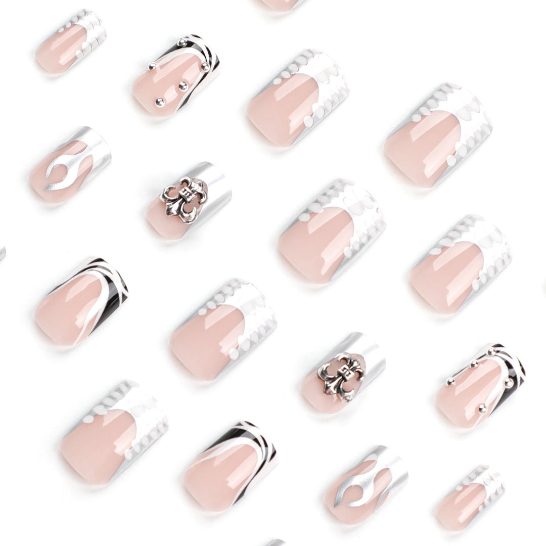Artistic nail extensions with metallic embellishments Stornfield