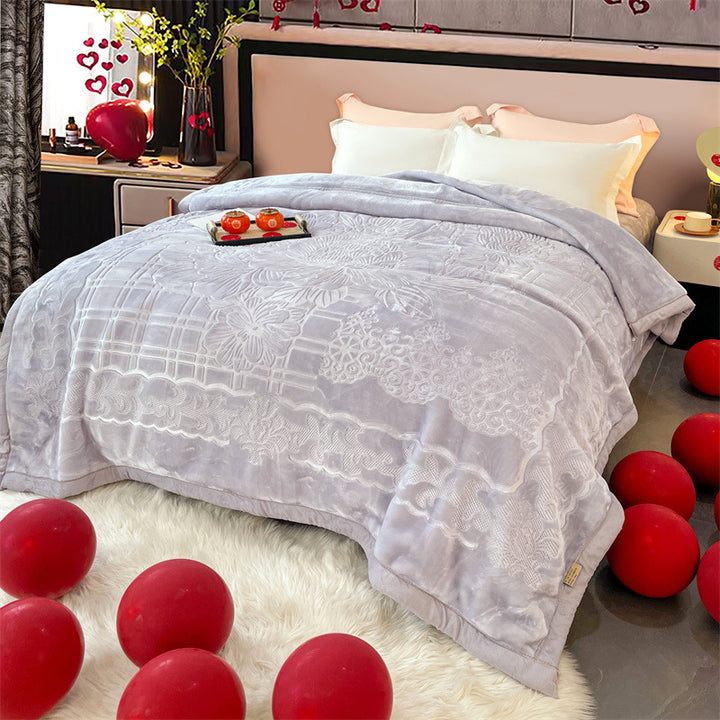 Cozy microfiber quilted blanket with floral relief embossing