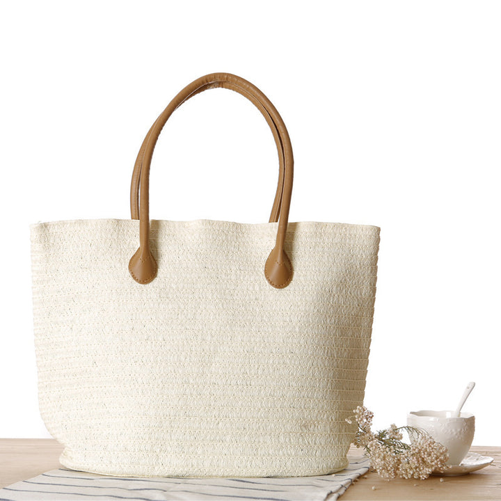 Spacious straw shopper with leather carrying handles Stornfield