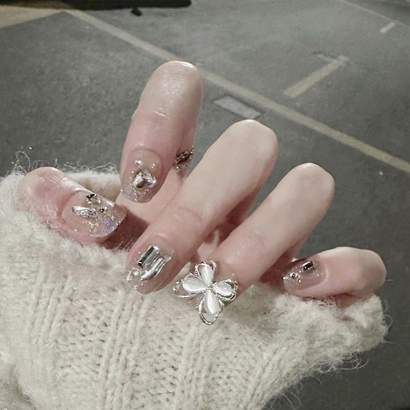 Nail art set with sparkling rhinestones and glitter elements Stornfield