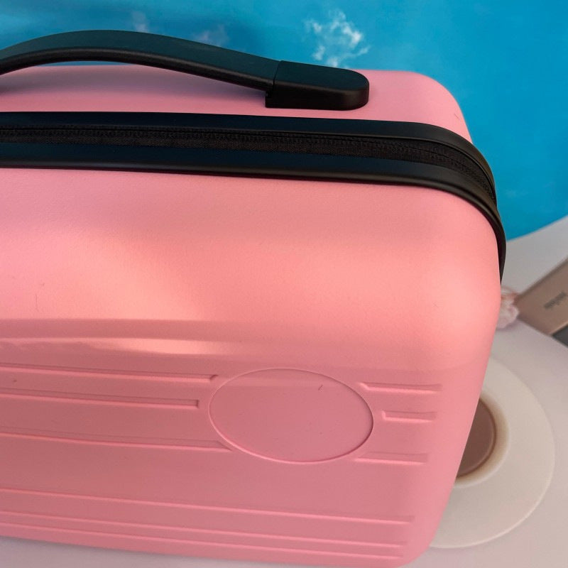 compact hardshell travel carry case with top handle and reinforced ridged shell Stornfield