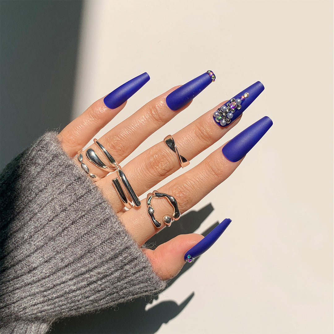 Nail extensions with elegant rhinestone embellishments Stornfield