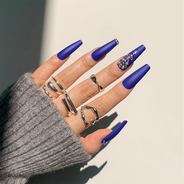 Nail extensions with elegant rhinestone embellishments Stornfield