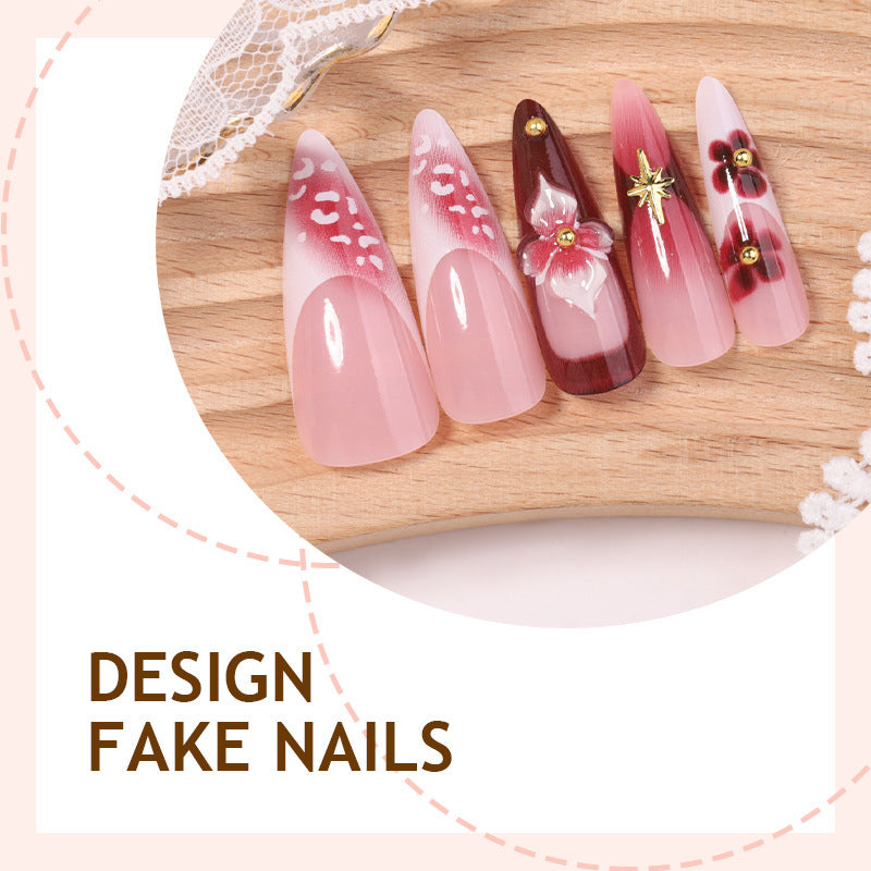 Artifical nail set with delicate floral design and glamorous accents Stornfield