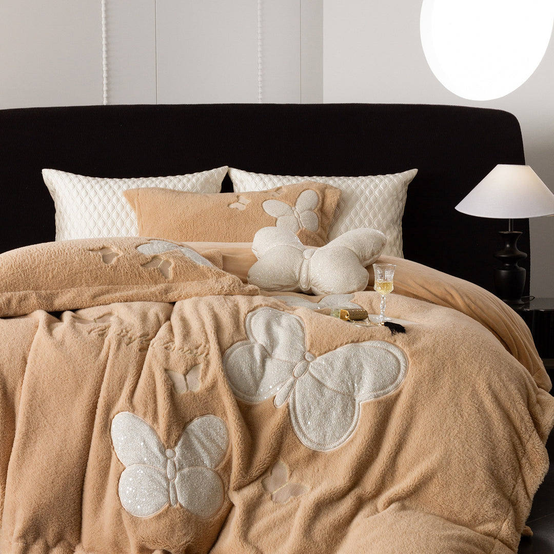 Cozy bedding and throw blanket set with applied butterfly appliqués and velvety microfleece look