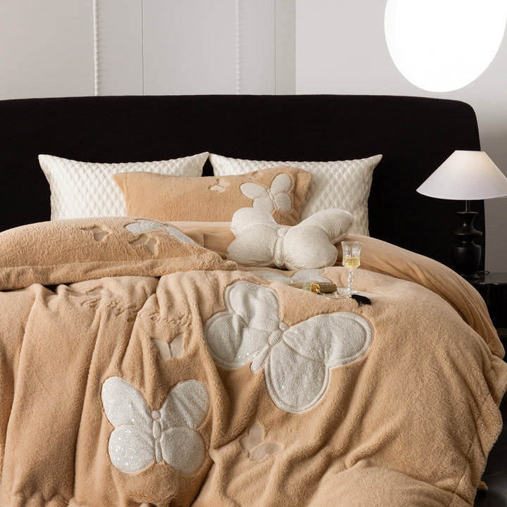 Cozy bedding and throw blanket set with applied butterfly appliqués and velvety microfleece look