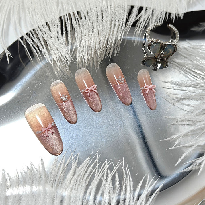 Elegant Artificial Nails with Delicate Gradients and Ribbons Stornfield