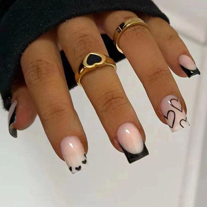 Elegant Heart-Embellished Nail Art Design Stornfield