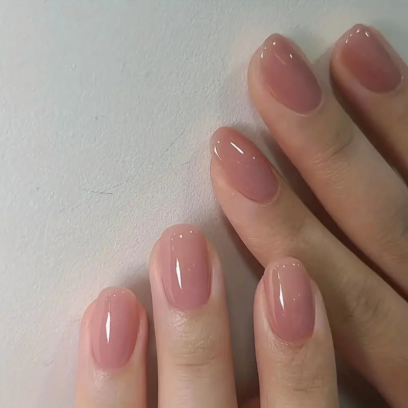 Artificial nail set with glossy finish and elegant accents Stornfield