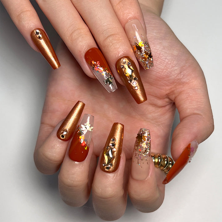 Artful Nail Extensions with Glitter and Flower Accents Stornfield