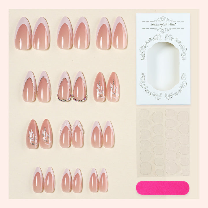 Artificial nail set with elegant tips and glitter accents Stornfield