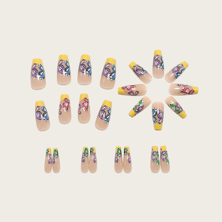 Nail set with intricate butterfly design Stornfield