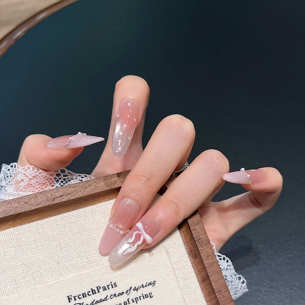 Elegant Long Press-On Nails with Decorative Accents Stornfield