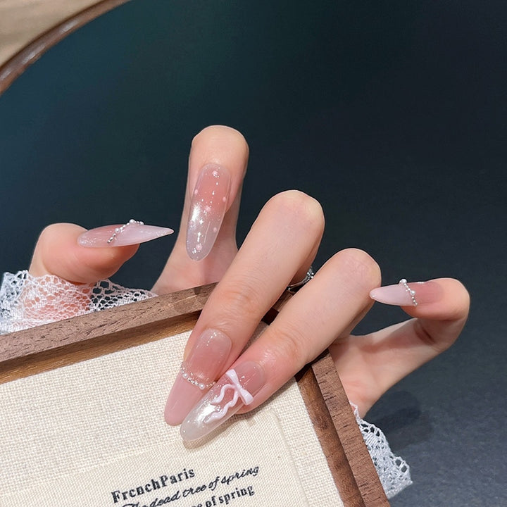 Elegant Long Press-On Nails with Decorative Accents Stornfield